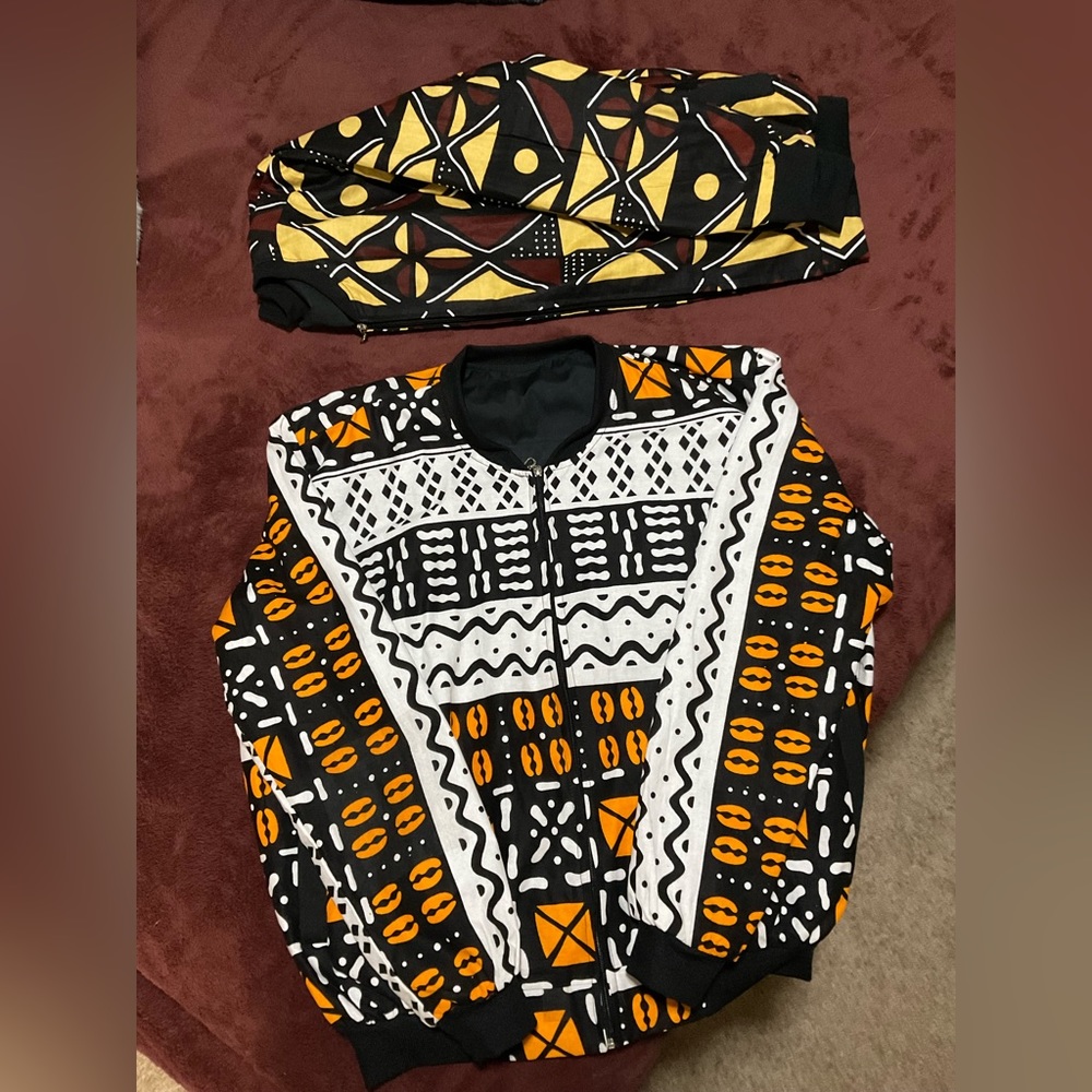 1 African designed jacket left.. the one with white